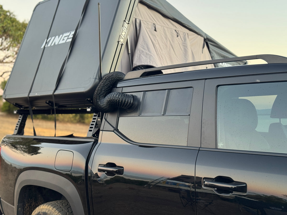 BYD Shark 6 supplying cooled airflow to rooftop tent using SINEWERX camping AC duct kit