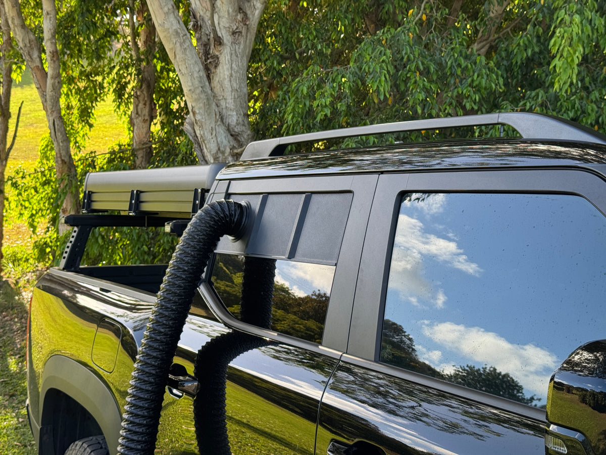 Duct routed from the BYD Shark 6 rear window panel down into the tub for swag camping