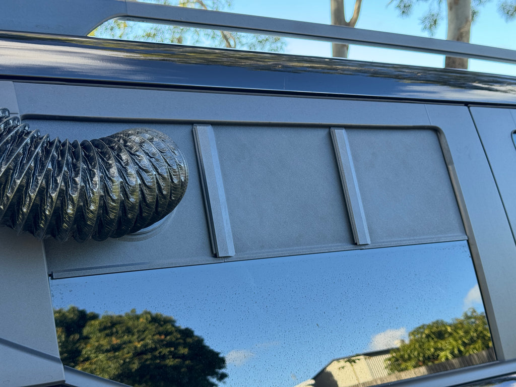 Close-up of the BYD Shark 6 rear window panel seal with the AC duct connected
