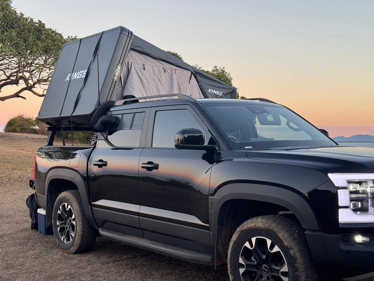 BYD Shark 6 supplying cooled airflow to rooftop tent using SINEWERX camping AC duct kit